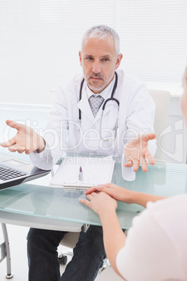 Doctor explaining at his patient