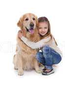Happy girl holding her dog