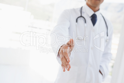 Doctor offering a handshake