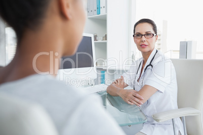 Doctor talking to her patient