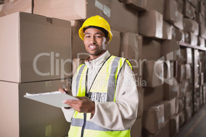 Warehouse worker with clipboard