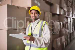 Warehouse worker with clipboard