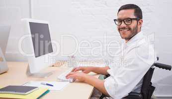 Businessman using computer at office desk