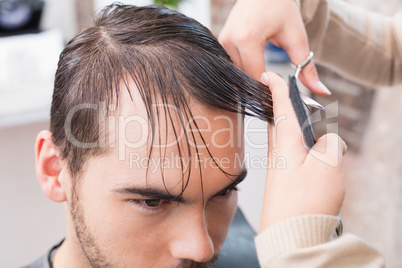 Man getting his hair trimmed