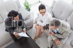 Business team discussing meeting notes