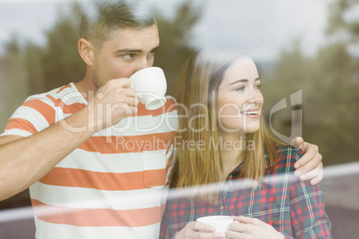 Cute couple looking out the window