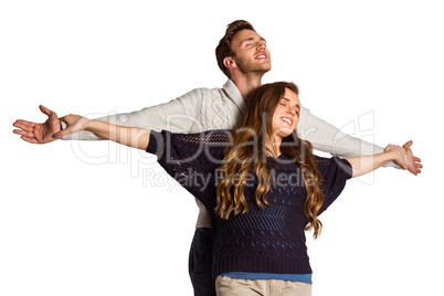Romantic young couple with arms out