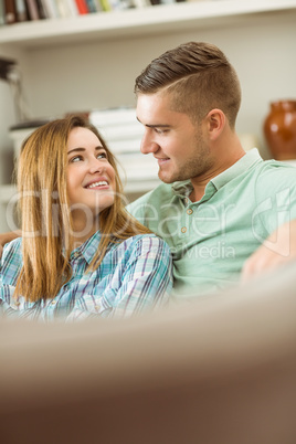 Cute couple relaxing on couch