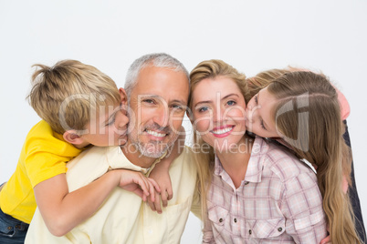 Happy family smiling and showing affection