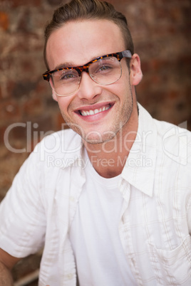Portrait of a man smiling at camera Portrait of a man smiling at camera