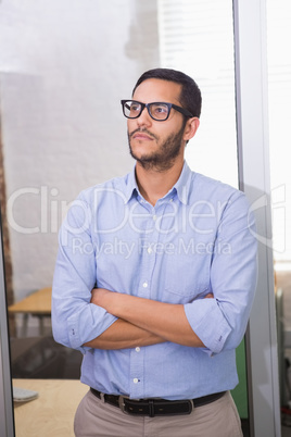 Thoughtful businessman looking away