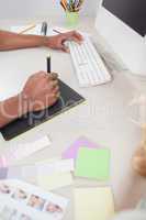 Designer sketching on graphics tablet