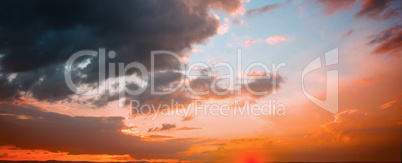 Orange and blue sky with clouds