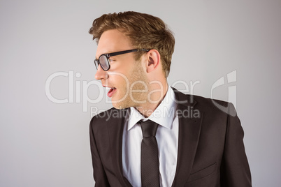 Young handsome businessman looking away