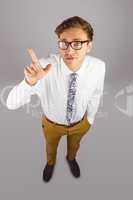 Young geeky businessman pointing to camera