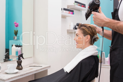 Woman getting her hair dried