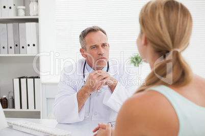 Doctor talking to his patient