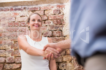 Close-up of business people shaking hands