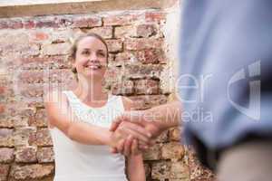 Close-up of business people shaking hands