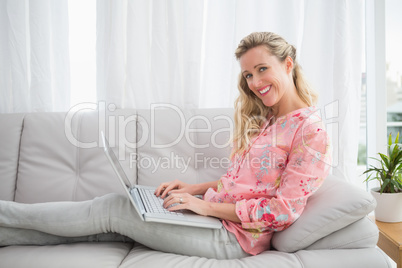 Beautiful blonde woman using laptop Beautiful blonde woman using laptop