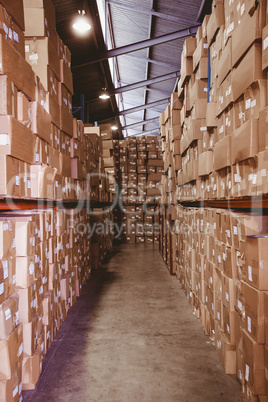 Shelves with boxes in warehouse