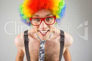 Geeky hipster in afro rainbow wig