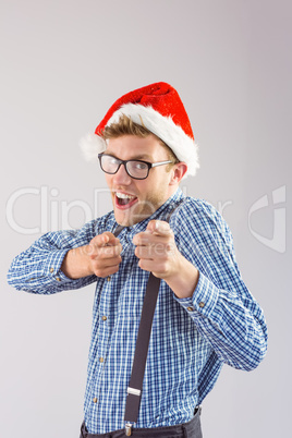 Geeky hipster wearing santa hat