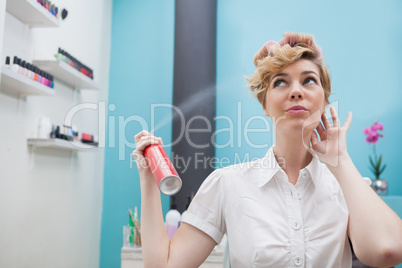 Customer using hair spray