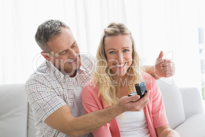 Man offering a romantic gift to his girlfriend