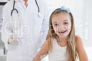 Smiling girl at the doctors