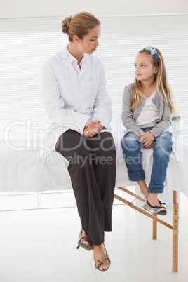 Doctor talking with her patient