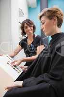 Hairdresser showing hair colour types
