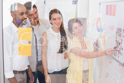 Casual business team listening during meeting