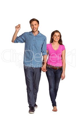 Full length of happy young couple