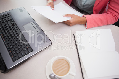 Casual businesswoman working at her desk