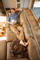 Young man napping on his couch