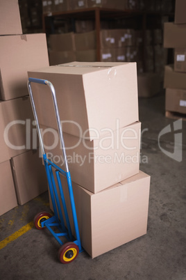 Boxes on trolley in warehouse