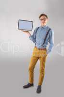 Geeky businessman showing his laptop