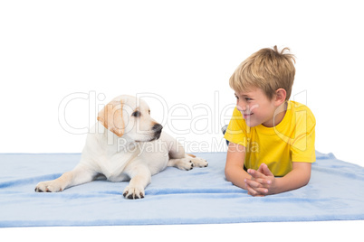 Happy little boy with puppy