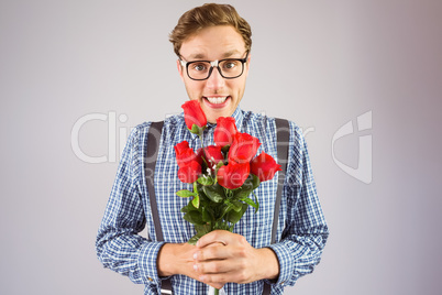 Geeky hipster holding a bunch of roses