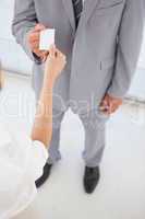 Businesswoman offering a client her business card