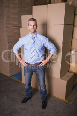 Serious male manager in the warehouse