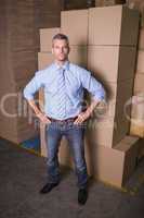 Serious male manager in the warehouse