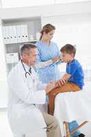 Small boy about to receive an injection