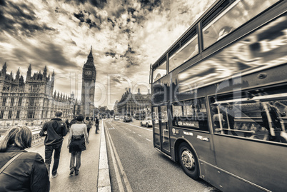 Double Decker bus crossing crowded Westminster Bridge