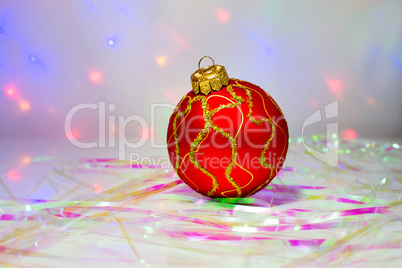 Red Christmas ball on the table