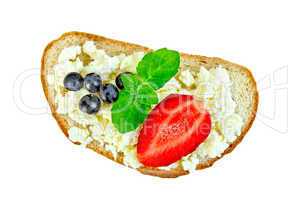 Bread with curd and berries in plate