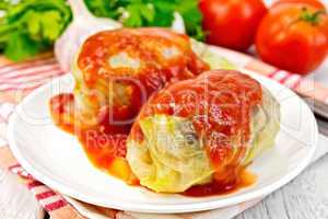 Cabbage stuffed in plate on board