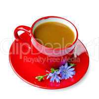Chicory drink in red cup on saucer