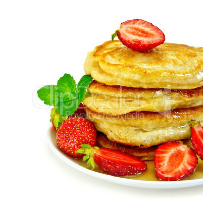 Flapjacks with strawberries and mint